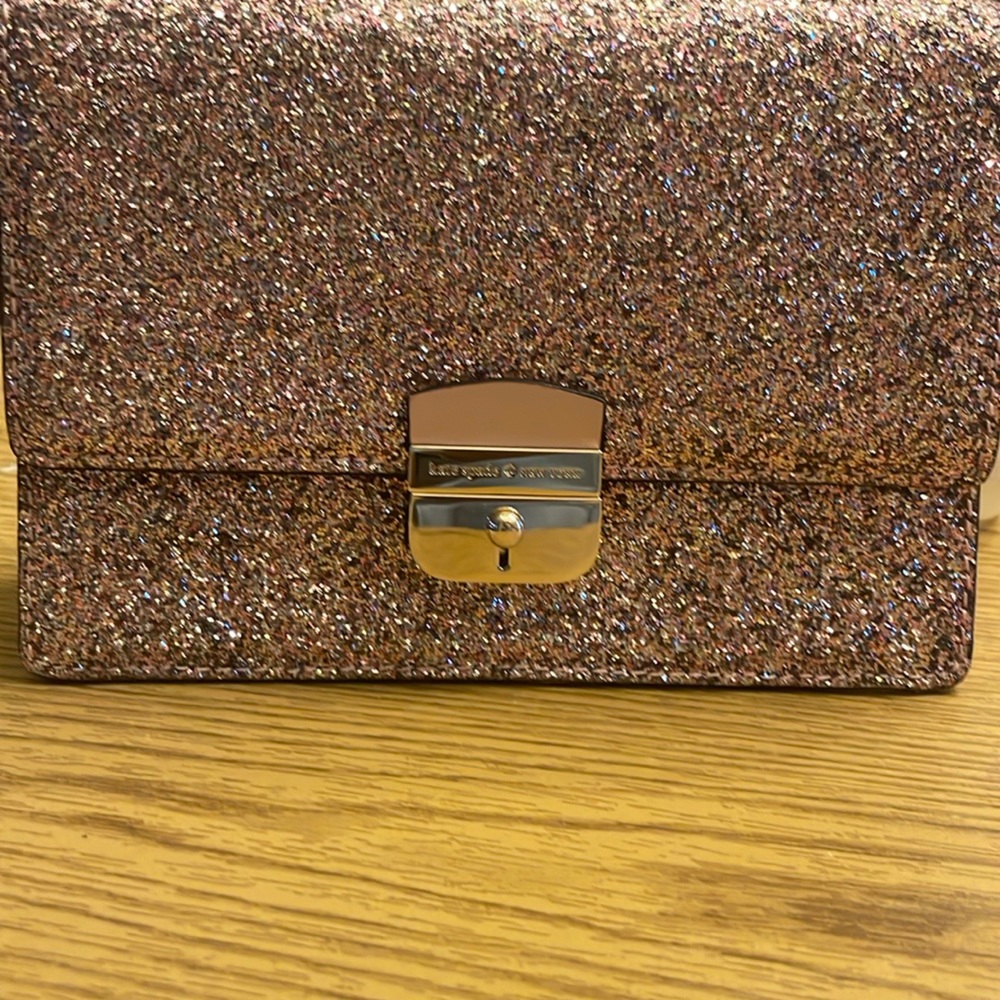 Kate Spade ——-Rose Gold purse NWOT  very pretty .Gold chain still wrapped